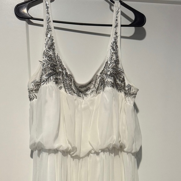 Elegant White dress with metal accents - Picture 1 of 2